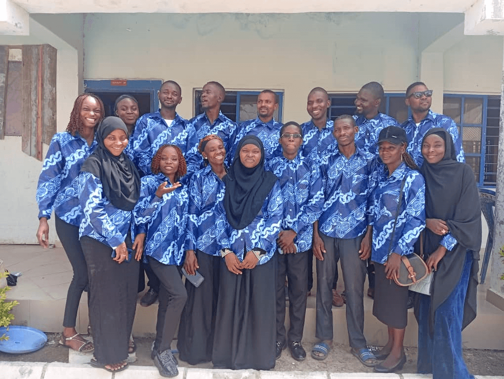 Teachers guiding students in a classroom